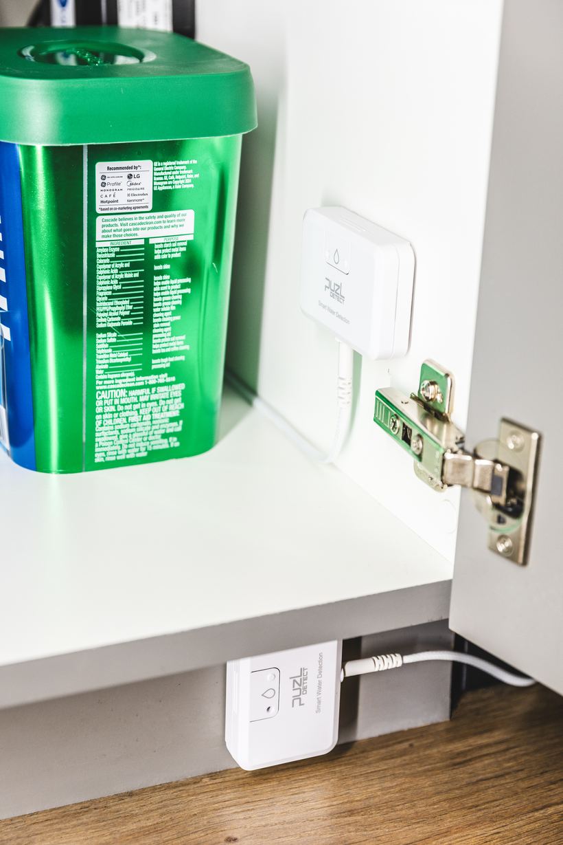 Two PuzL Detect units protecting a kitchen sink cabinet